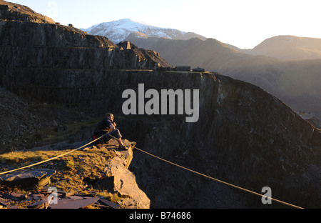 rock climber in the slate quarries above llanberis in North Wales Snowdonia. Stock Photo