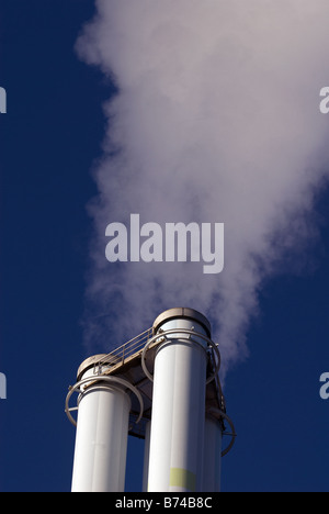 Emissions from the chimney of a commercial waste disposal incinerator, Levekusen, North Rhine-Westphalia, Germany. Stock Photo