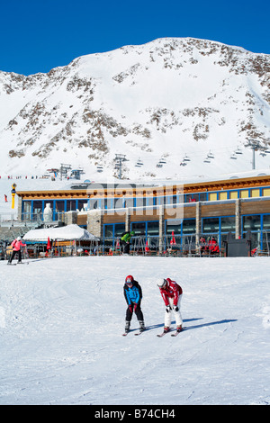 a young boy getting skiing lessons at mountain station Gamsgarten at Stubai Glacier in Tyrol, Austria Stock Photo