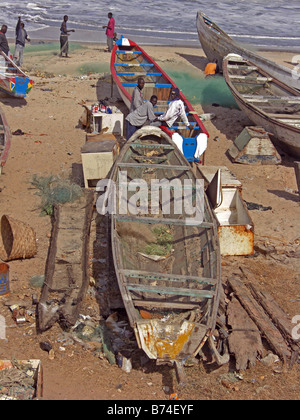 Fishing boat, Pirogue, in the fishing port at Bakau near Banjul, in The Gambia, West Africa. Stock Photo