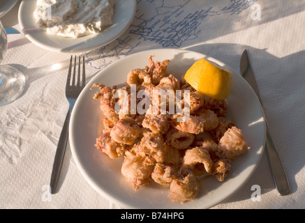 Typical paper tablecloth in Greek taverna restaurant with print of