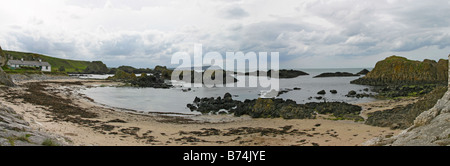 Northern Ireland Ballintoy harbour storm comming featured in Game of Thrones panorama Stock Photo