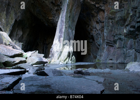 Cathedral Cavern a cave formed in disused slate quarry in Little Landgale The Lake District Cumbria England Stock Photo