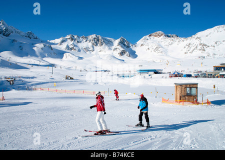 a young boy getting skiing lessons at mountain station Gamsgarten at Stubai Glacier in Tyrol, Austria Stock Photo