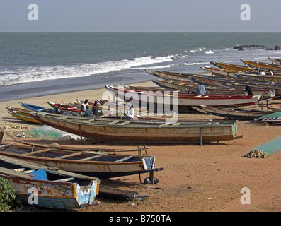 Fishing boat, Pirogue, in the fishing port at Bakau near Banjul, in The Gambia, West Africa. Stock Photo