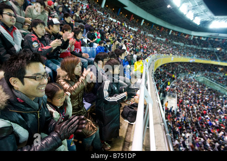Japanese football soccer fans in Nissan Stadium, Shin-Yokohama, Japan Stock Photo