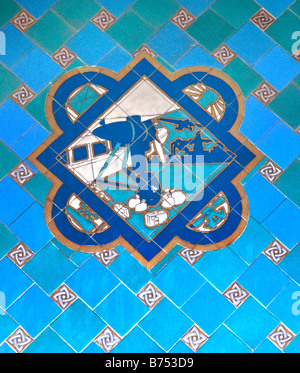 Close-up of tiles depicting 1930 Ford Trimotor airplane on wall of Los Angeles City Hall signifying city's aviation activity Stock Photo
