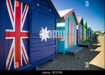 Beautifully-designed bathing boxes line the Dendy Street Beach in Melbourne, Australia. Stock Photo