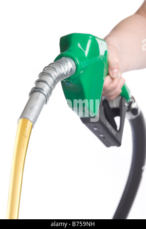 Hand holding gas nozzle with gas flowing out, Winnipeg, Manitoba Stock Photo