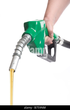 Hand holding gas nozzle with gas flowing out, Winnipeg, Manitoba Stock Photo