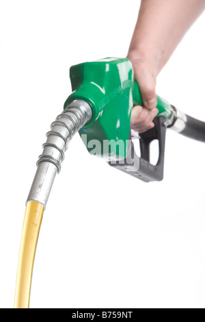 Hand holding gas nozzle with gas flowing out, Winnipeg, Manitoba Stock Photo