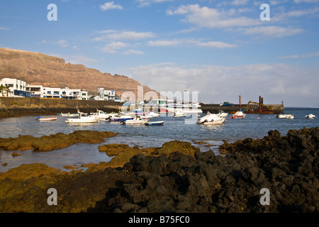 Orzola harbour harbor port ships boats ferry fishing lanzarote canaries canary islands spain europe travel tourism Stock Photo