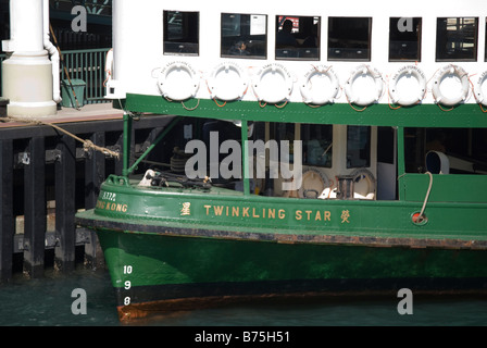 Star Ferry berthing at terminal, Central Pier, Sheung Wan, Victoria Harbour, Hong Kong Island, Hong Kong, China Stock Photo