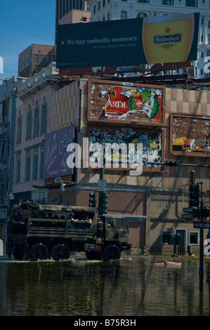 6 wheeler military vehicle driving through flood waters on Canal St New Orleans