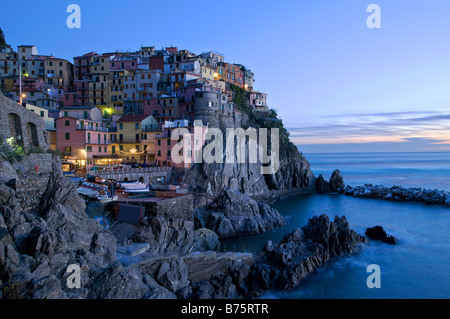 Night view of the village of Manarola one of the famous five villages of the Cinque Terre The Five Lands in Liguria Italy Stock Photo