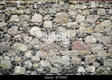 Old stone and flint wall Stock Photo