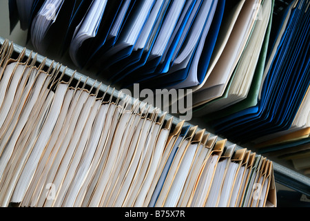 a stapler and the documents files in office on the table, staple the ...