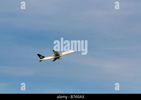 Star Alliance jet airliner taking off from Boston Logan airport Boston Massachusetts USA Stock Photo
