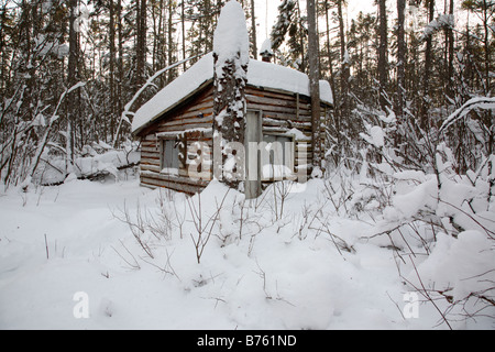Hunting camp in Spuce Swamp during the winter months Located in Fremont New Hampshire USA Stock Photo