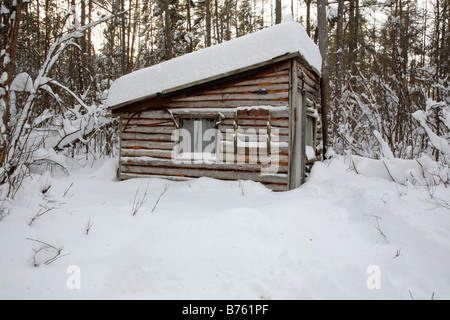 Hunting camp in Spuce Swamp during the winter months Located in Fremont New Hampshire USA Stock Photo