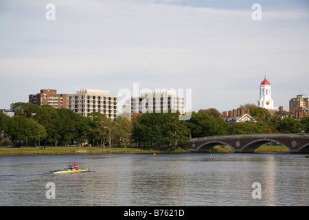 Rowing on the Charles River and Harvard University buildings in Cambridge Greater Boston Massachusetts USA Stock Photo