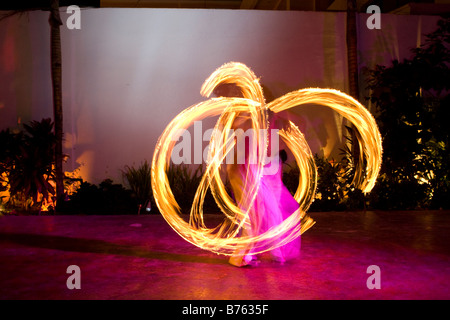 Fire Dancers putting on a show at night in Playa Del Carmen Mexico Stock Photo