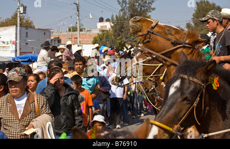 CABALLEROS or Mexican cowboys ride into town for the festival of the VIRGIN OF GUADALUPE LOS RODRIGUEZ GUANAJUATO MEXICO Stock Photo