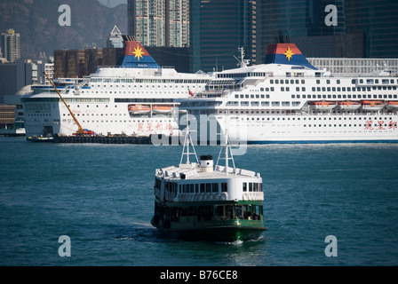 Star Ferry crossing from Tsim Sha Tsui, Central Pier, Sheung Wan, Victoria Harbour, Hong Kong Island, Hong Kong, China Stock Photo