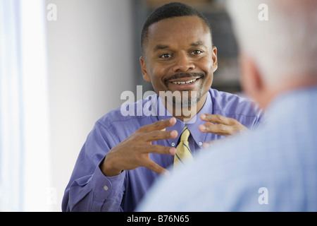 Two businessmen having meeting Stock Photo