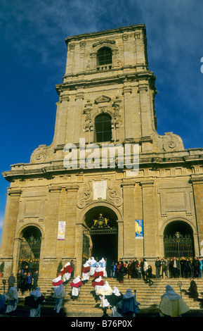 Penitents at Settimana Santa Holy Week Procession entering Cathedral on Palm Sunday in Enna Sicily Italy Stock Photo