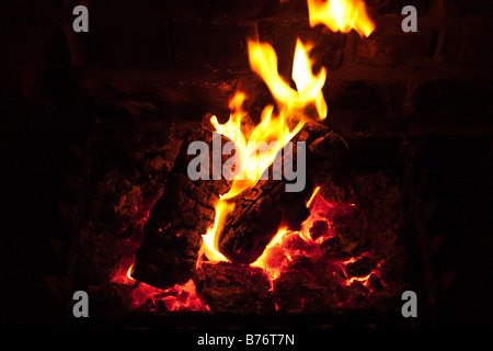 Domestic open log fire Stock Photo