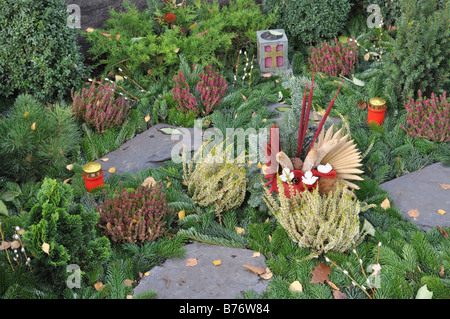 Autumnal grave decoration Stock Photo