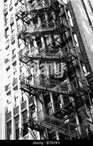 FIRE ESCAPE ON THE SIDE OF THE OLD DOWNTOWN BUILDING ON ADAMS STREET IN CHICAGO ILLINOIS USA Stock Photo