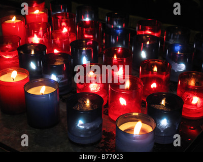 Votive Candles in church Ireland Stock Photo