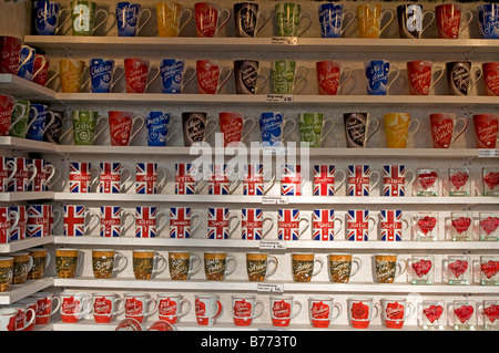 China Mugs being sold as souvenirs on a stall at the Winter Wonderland at Hyde Park London, England UK Stock Photo