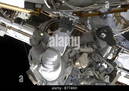 Astronaut participates in extravehicular activity. Stock Photo