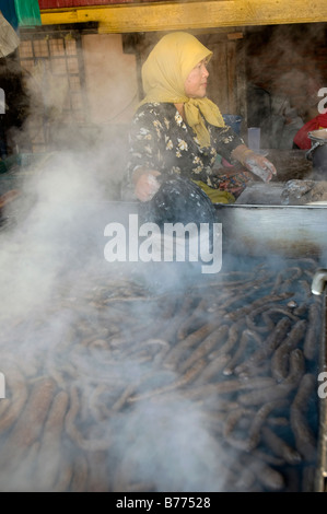 Traditional fish sausage maker in Terengganu Malaysia Fish sausage normally can be consumed after boiling them or deep frying Stock Photo