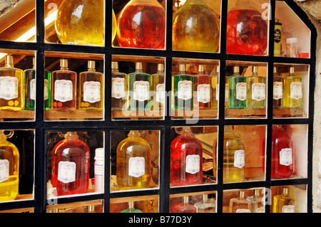 Bottles of perfume in shop window, Gourdon, Alpes-Maritimes, Provence-Alpes-Cote d'Azur, Southern France, France, Europe Stock Photo