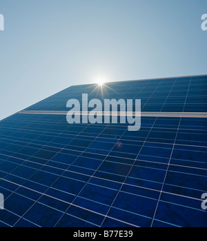 Sun shining on solar panel Stock Photo