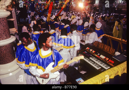 Members of the Celestial Church Of Christ play guitar during a harvest festival celebration. Stock Photo