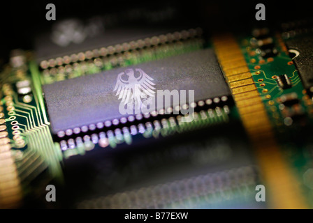 German federal eagle on a computer circuit board, symbolic image, online searches Stock Photo