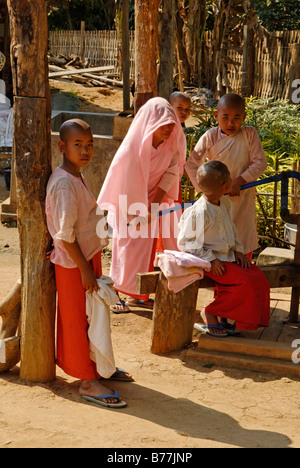 Young novices in a Buddhist monastery, Bhamo, Kachin State, Burma, Myanmar, Asia Stock Photo