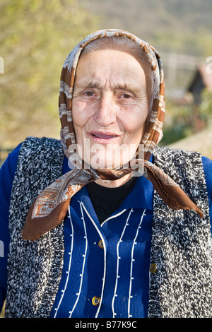 Portrait of a Romanian woman wearing a headscarf, Bezded, Salaj, Transylvania, Romania, Europe Stock Photo