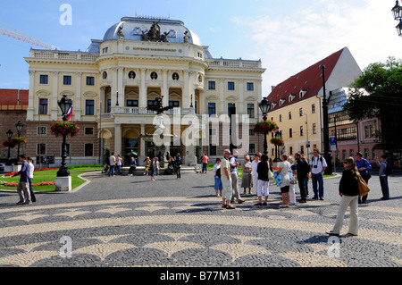 Tourists in front of the Slovak National Theatre, Slovenske narodne divadlo, Bratislava, formerly known as Pressburg, Slovakia, Stock Photo