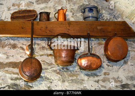 Copper kettles, copper pans and other crockery in a farmhouse in Tessin, Switzerland, Europe Stock Photo