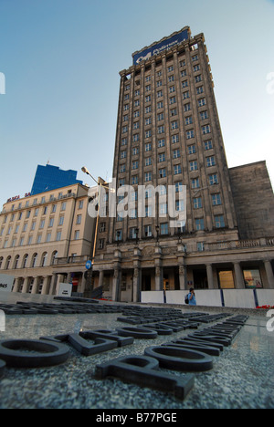 Remains of Warsaw Uprasing from 1944 against Nazi occupation. Prudential building and Warsaw Uprising Insurgents memorial. Stock Photo