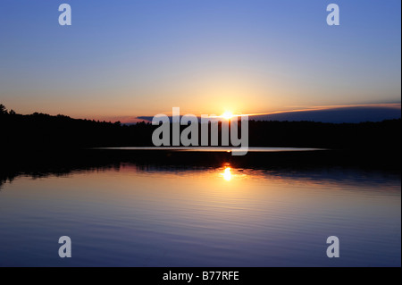 Sunset on Walden Pond Concord MA made famous by Henry David Thoreau Stock Photo