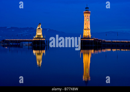 Illuminated harbor at night in Lindau, Lake Constance, Bavaria, Germany Stock Photo