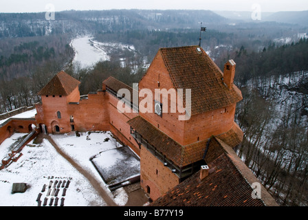 Courtyard of Turaida Castle and the surrounding forest in winter, Latvia Stock Photo