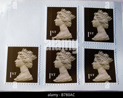 A book of six uk first class stamps,with one used. Stock Photo